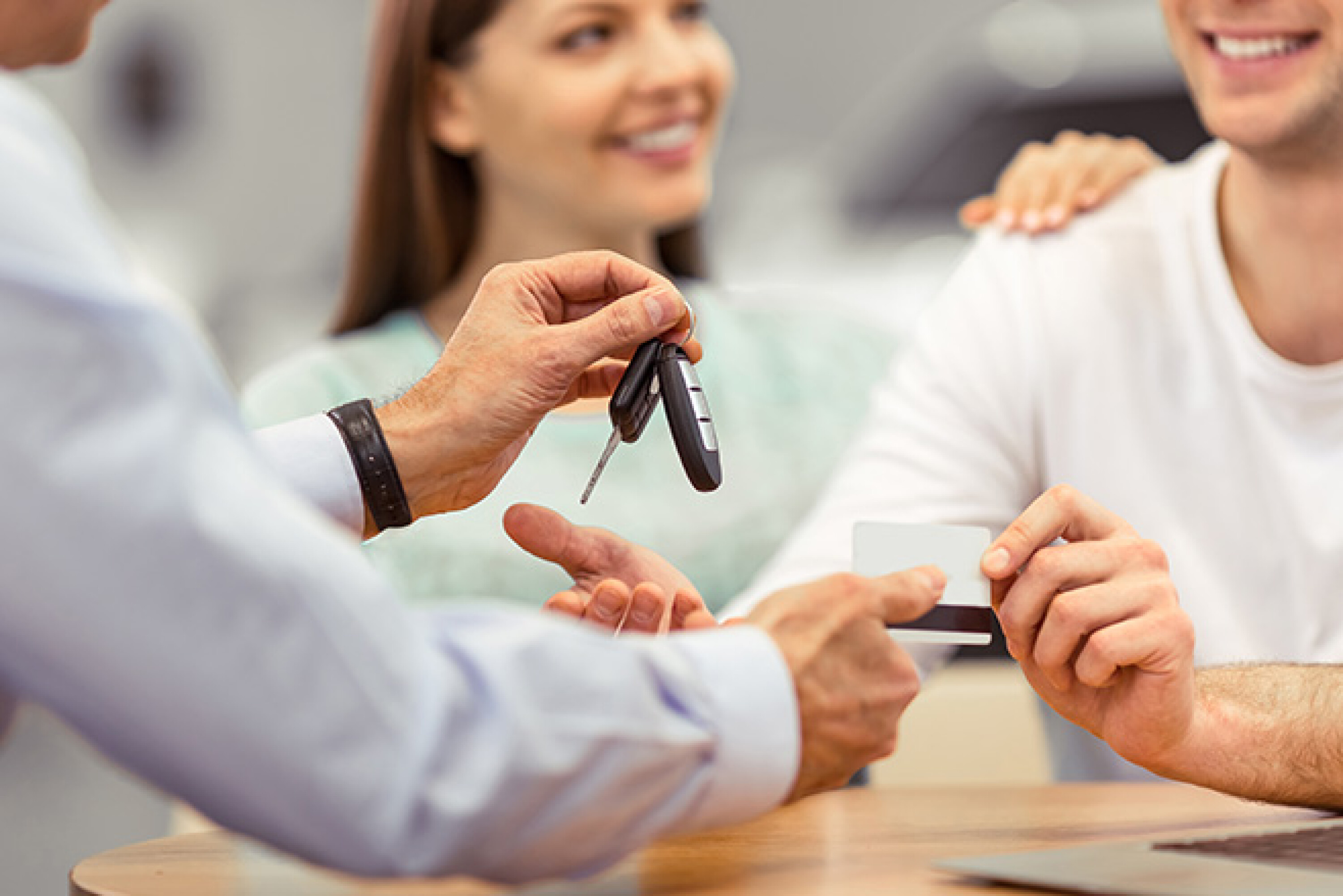Young couple buying car